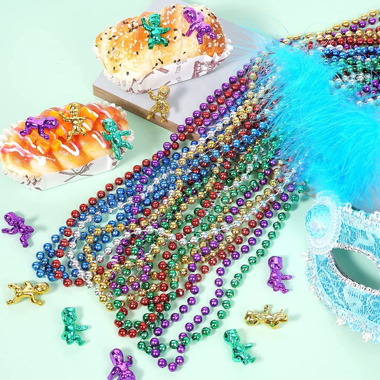 1 dozen King Cake Babies and 1 dozen Mardi Gras beads purple green gold metallic finish Baby